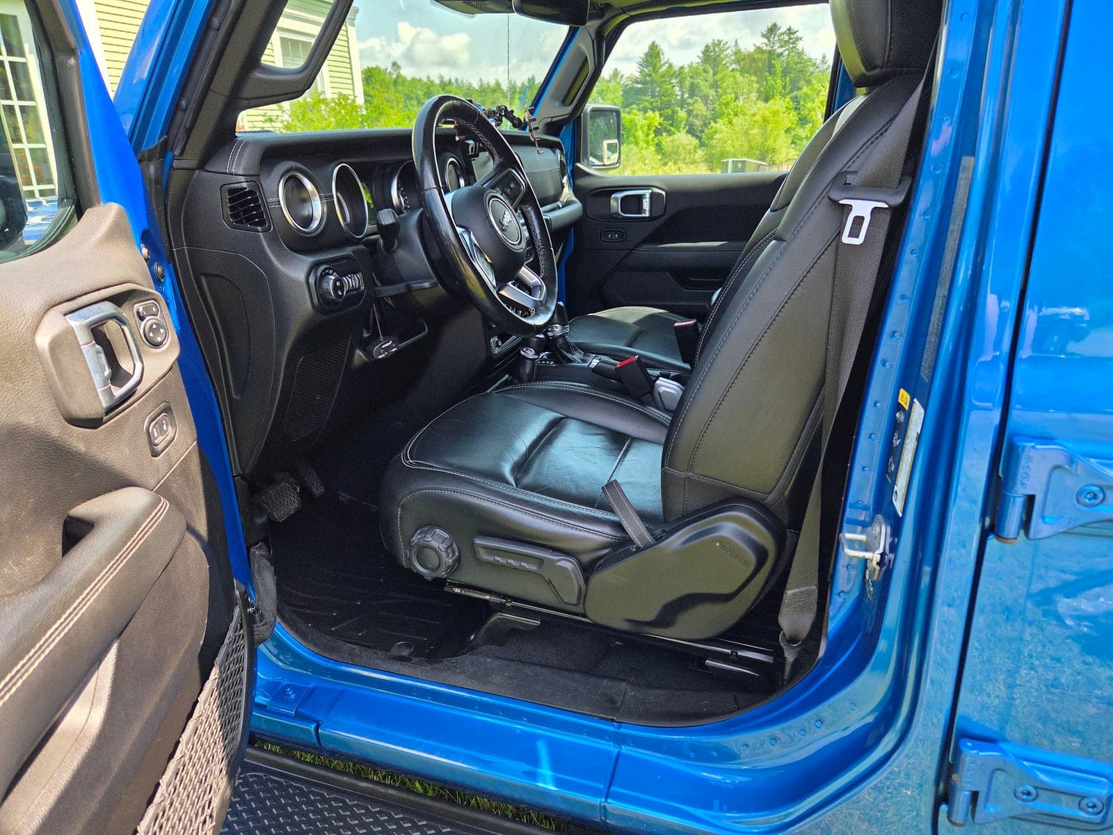 Restored 2018 Jeep Grand Cherokee interior with conditioned leather — after Arise & Shine VT mobile detail in Williston, VT